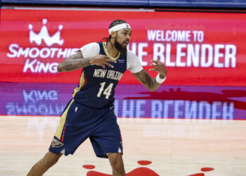 NEW ORLEANS, LOUISIANA - DECEMBER 5:  Brandon Ingram #14 of the New Orleans Pelicans reacts after scoring on a three point basket against the Phoenix Suns during the second half of a game at the Smoothie King Center on December 5, 2024 in New Orleans, Louisiana. NOTE TO USER: User expressly acknowledges and agrees that, by downloading and or using this photograph, User is consenting to the terms and conditions of the Getty Images License Agreement. (Photo by Derick E. Hingle/Getty Images)