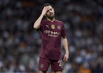 MADRID, SPAIN - FEBRUARY 19: Bernardo Silva of Manchester City reacts during the UEFA Champions League 2024/25 League Knockout Play-off second leg match between Real Madrid C.F. and Manchester City at Santiago Bernabeu stadium on February 19, 2025 in Madrid, Spain. (Photo by Diego Souto/Getty Images)