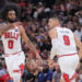 CHICAGO, IL - OCTOBER 30: Chicago Bulls guard Coby White (0) and Chicago Bulls center Nikola Vucevic (9)  during the second half against the Orlando Magic on October 30, 2024 at the United Center in Chicago, Illinois. (Photo by Melissa Tamez/Icon Sportswire via Getty Images)