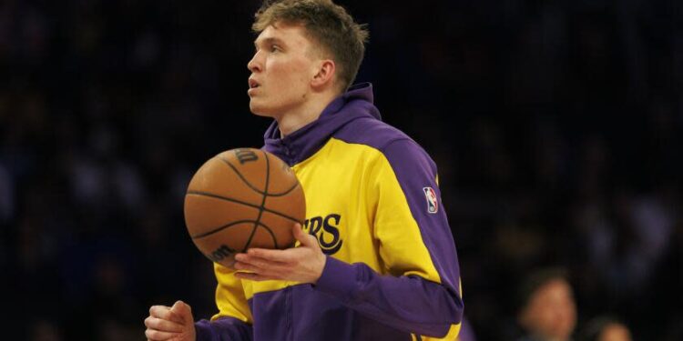 LOS ANGELES, CA - DECEMBER 8, 2024: Los Angeles Lakers guard Dalton Knecht (4) before the game against the Portland Trail Blazers at Crypto.com Arena on December 8, 2024 in Los Angeles, California. (Gina Ferazzi / Los Angeles Times)