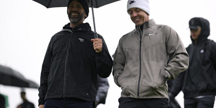 LA JOLLA, CALIFORNIA - FEBRUARY 12: Rory McIlroy of Northern Ireland and Donald Trump Jr. walk the ninth hole prior to The Genesis Invitational 2025 at Torrey Pines Golf Course on February 12, 2025 in La Jolla, California. (Photo by Orlando Ramirez/Getty Images)