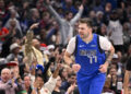 Dec 25, 2024; Dallas, Texas, USA; Dallas Mavericks guard Luka Doncic (77) celebrates after making a basket against the Minnesota Timberwolves during the first quarter at the American Airlines Center. Mandatory Credit: Jerome Miron-Imagn Images