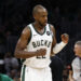 Mar 20, 2024; Boston, Massachusetts, USA; Milwaukee Bucks forward Khris Middleton (22) pumps his fist after hitting a basket against the Boston Celtics during the second half at TD Garden. Mandatory Credit: Winslow Townson-Imagn Images