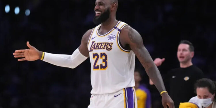 Dec 15, 2024; Los Angeles, California, USA; Los Angeles Lakers forward LeBron James (23) reacts in the first half against the Memphis Grizzlies at Crypto.com Arena. Mandatory Credit: Kirby Lee-Imagn Images