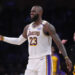 Dec 15, 2024; Los Angeles, California, USA; Los Angeles Lakers forward LeBron James (23) reacts in the first half against the Memphis Grizzlies at Crypto.com Arena. Mandatory Credit: Kirby Lee-Imagn Images