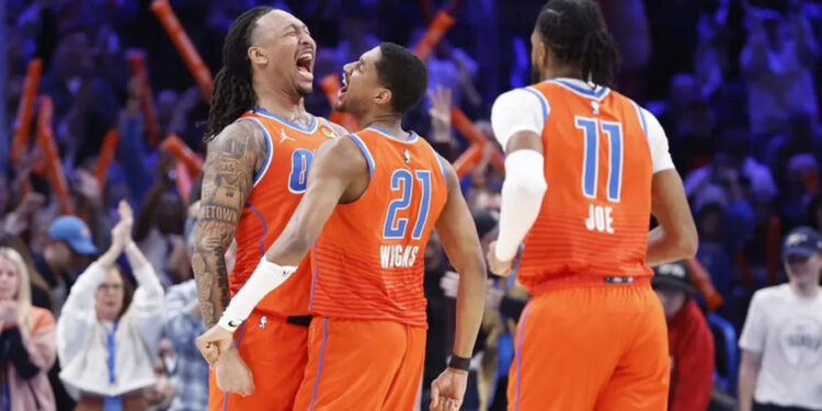 Jan 3, 2025; Oklahoma City, Oklahoma, USA; Oklahoma City Thunder forward Jaylin Williams (6) and guard Aaron Wiggins (21) celebrate after scoring against the New York Knicks during the second half at Paycom Center. Mandatory Credit: Alonzo Adams-Imagn Images