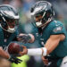 Jan 26, 2025; Philadelphia, PA, USA; Philadelphia Eagles quarterback Jalen Hurts (1) and running back Saquon Barkley (26) warm up before the NFC Championship game at Lincoln Financial Field. Mandatory Credit: Bill Streicher-Imagn Images