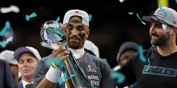 Feb 9, 2025; New Orleans, LA, USA; Philadelphia Eagles quarterback Jalen Hurts (1) celebrates with head coach Nick Sirianni after winning against Kansas City Chiefs in Super Bowl LIX at Caesars Superdome. Mandatory Credit: Geoff Burke-Imagn Images