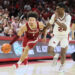 Feb 8, 2025; Fayetteville, Arkansas, USA; Alabama Crimson Tide guard mark Sears (1) drives against Arkansas Razorbacks forward Billy Richmond III (24) during the second half at Bud Walton Arena. Alabama won 85-81. Mandatory Credit: Nelson Chenault-Imagn Images