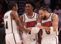 Feb 12, 2025; Houston, Texas, USA; Houston Rockets guard Jalen Green (4) and forward Amen Thompson (1) celebrate with forward Dillon Brooks (9) after a three point basket against the Phoenix Suns in the second half at Toyota Center. Mandatory Credit: Thomas Shea-Imagn Images