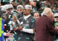 Feb 9, 2025; New Orleans, LA, USA; Philadelphia Eagles quarterback Jalen Hurts (1) hoists the Vince Lombardi Trophy after defeating the Kansas City Chiefs in Super Bowl LIX at Ceasars Superdome. Mandatory Credit: Kirby Lee-Imagn Images