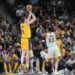 Nov 27, 2024; San Antonio, Texas, USA; Los Angeles Lakers guard Dalton Knecht (4) shoots over San Antonio Spurs guard Tre Jones (33) in the first half at Frost Bank Center. Mandatory Credit: Daniel Dunn-Imagn Images