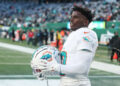 Jan 5, 2025; East Rutherford, New Jersey, USA; Miami Dolphins wide receiver Tyreek Hill (10) on the field before the game against the New York Jets at MetLife Stadium. Mandatory Credit: Vincent Carchietta-Imagn Images