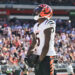 Oct 20, 2024; Cleveland, Ohio, USA; Cincinnati Bengals wide receiver Tee Higgins (5) celebrates after scoring a touchdown during the second half against the Cleveland Browns at Huntington Bank Field. Mandatory Credit: Ken Blaze-Imagn Images