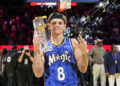 Feb 15, 2025; San Francisco, CA, USA; Osceola Magic guard Mac McClung celebrates with the trophy after winning the slam dunk competition during All Star Saturday Night ahead of the 2025 NBA All Star Game at Chase Center. Mandatory Credit: Kyle Terada-Imagn Images