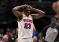 Feb 12, 2025; Dallas, Texas, USA; Golden State Warriors forward Draymond Green (23) reacts to a foul call on three point attempt by Dallas Mavericks guard Kyrie Irving (not pictured) during the fourth quarter at the American Airlines Center. Mandatory Credit: Jerome Miron-Imagn Images