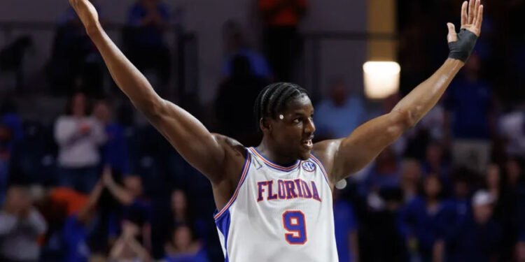 Feb 15, 2025; Gainesville, Florida, USA; Florida Gators center Rueben Chinyelu (9) gestures toward the crowd against the South Carolina Gamecocks during the second half at Exactech Arena at the Stephen C. O'Connell Center. Mandatory Credit: Matt Pendleton-Imagn Images