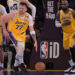 Feb 10, 2025; Los Angeles, California, USA; Los Angeles Lakers guard Luka Doncic (77) takes the ball down court as forward LeBron James (23) looks on against the Utah Jazz at Crypto.com Arena. Mandatory Credit: Jayne Kamin-Oncea-Imagn Images