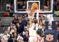 Auburn Tigers forward Johni Broome (4) dunks the ball as Auburn Tigers take on Arkansas Razorbacks at Neville Arena in Auburn, Ala., on Wednesday, Feb. 19, 2025. Auburn Tigers lead Arkansas Razorbacks 33-27 at halftime. PHOTO USA TODAY SPORTS IMAGES