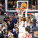 Auburn Tigers forward Johni Broome (4) dunks the ball as Auburn Tigers take on Arkansas Razorbacks at Neville Arena in Auburn, Ala., on Wednesday, Feb. 19, 2025. Auburn Tigers lead Arkansas Razorbacks 33-27 at halftime. PHOTO USA TODAY SPORTS IMAGES