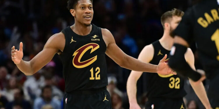 Feb 21, 2025; Cleveland, Ohio, USA; Cleveland Cavaliers forward De'Andre Hunter (12) reacts during the second half against the New York Knicks at Rocket Arena. Mandatory Credit: Ken Blaze-Imagn Images