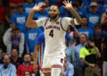 Feb 1, 2025; Oxford, Mississippi, USA; Auburn Tigers forward/center Johni Broome (4) reacts during the second half against the Mississippi Rebels at The Sandy and John Black Pavilion at Ole Miss. Mandatory Credit: Petre Thomas-Imagn Images