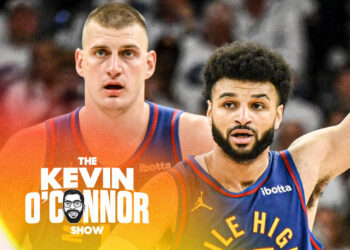 MINNEAPOLIS , MN - MAY 10: Jamal Murray (27) and Nikola Jokic (15) of the Denver Nuggets lead the defense as Mike Conley (10) brings the ball up court during the third quarter at Target Center in Minneapolis, Minnesota on Friday, May 10, 2024. (Photo by AAron Ontiveroz/The Denver Post)