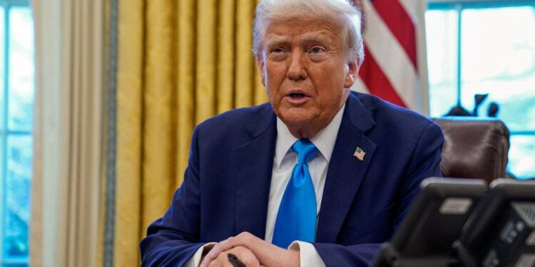 FILE PHOTO: U.S. President Donald Trump at the Oval Office in the White House