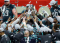 Eagles players hoist the Lombardi Trophy. (Chris Graythen/Getty Images)