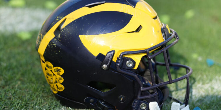 TAMPA, FL - DECEMBER 31: a Michigan Wolverines helmet rests near the sidelines during the ReliaQuest Bowl game between the Michigan Wolverines and the Alabama Crimson Tide on Tuesday, December 31, 2024 at Raymond James Stadium in Tampa, Fla. (Photo by Peter Joneleit/Icon Sportswire via Getty Images)