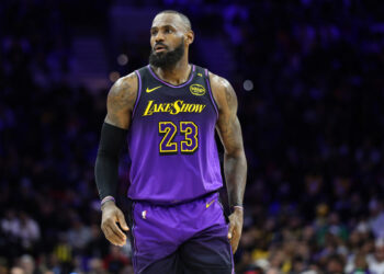 PHILADELPHIA, PENNSYLVANIA - JANUARY 28: LeBron James #23 of the Los Angeles Lakers looks on during a game against the Philadelphia 76ers at the Wells Fargo Center on January 28, 2025 in Philadelphia, Pennsylvania. NOTE TO USER: User expressly acknowledges and agrees that, by downloading and or using this photograph, User is consenting to the terms and conditions of the Getty Images License Agreement. (Photo by Emilee Chinn/Getty Images)