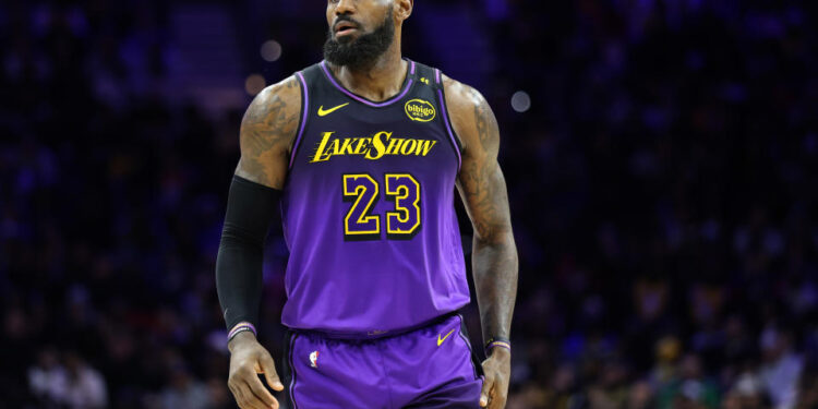 PHILADELPHIA, PENNSYLVANIA - JANUARY 28: LeBron James #23 of the Los Angeles Lakers looks on during a game against the Philadelphia 76ers at the Wells Fargo Center on January 28, 2025 in Philadelphia, Pennsylvania. NOTE TO USER: User expressly acknowledges and agrees that, by downloading and or using this photograph, User is consenting to the terms and conditions of the Getty Images License Agreement. (Photo by Emilee Chinn/Getty Images)