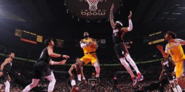 PORTLAND, OR - FEBRUARY 20: LeBron James #23 of the Los Angeles Lakers drives.