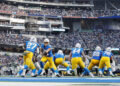 INGLEWOOD, CA - NOVEMBER 10: Los Angeles Chargers quarterback Justin Herbert (10) hands off to Los Angeles Chargers running back J.K. Dobbins (27) during the Tennessee Titans vs Los Angeles Chargers game on November 10, 2024, at SoFi Stadium in Inglewood, CA. (Photo by Jevone Moore/Icon Sportswire via Getty Images)