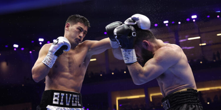 RIYADH, SAUDI ARABIA - FEBRUARY 22: Dmitrii Bivol fights Artur Beterbiev as the headline act of Beterbiev v Bivol 2: The Last Crescendo at Kingdom Arena on February 22, 2025 in Riyadh. (Photo by Mark Robinson/Getty Images).