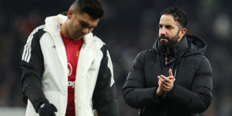 LONDON, ENGLAND - FEBRUARY 16: Ruben Amorim, Manager of Manchester United, applauds the fans after the team's defeat in the Premier League match between Tottenham Hotspur FC and Manchester United FC at Tottenham Hotspur Stadium on February 16, 2025 in London, England. (Photo by Alex Pantling/Getty Images)