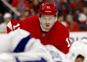 Feb 8, 2025; Detroit, Michigan, USA; Detroit Red Wings right wing Vladimir Tarasenko (11) gets set during a face off in the second period against the Tampa Bay Lightning at Little Caesars Arena<p>Rick Osentoski&comma; Imagn Images</p>