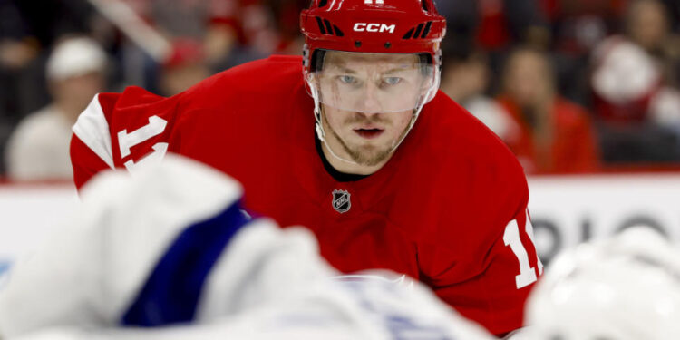 Feb 8, 2025; Detroit, Michigan, USA; Detroit Red Wings right wing Vladimir Tarasenko (11) gets set during a face off in the second period against the Tampa Bay Lightning at Little Caesars Arena<p>Rick Osentoski&comma; Imagn Images</p>