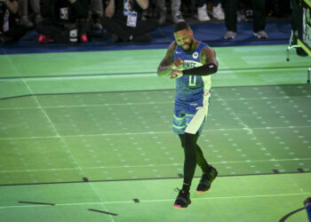 INDIANAPOLIS , IN - FEBRUARY 17: Damian Lillard calls Dame Time after winning during the NBA All-Star Three-Point contest at Lucas Oil Stadium in Indianapolis, Indiana on Saturday, February 17, 2024. (Photo by AAron Ontiveroz/The Denver Post)