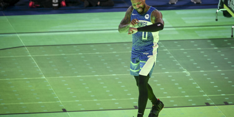 INDIANAPOLIS , IN - FEBRUARY 17: Damian Lillard calls Dame Time after winning during the NBA All-Star Three-Point contest at Lucas Oil Stadium in Indianapolis, Indiana on Saturday, February 17, 2024. (Photo by AAron Ontiveroz/The Denver Post)