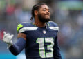 SEATTLE, WASHINGTON - NOVEMBER 24: Ernest Jones IV #13 of the Seattle Seahawks looks on against the Arizona Cardinals at Lumen Field on November 24, 2024 in Seattle, Washington. (Photo by Steph Chambers/Getty Images)