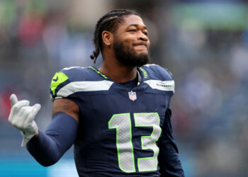 SEATTLE, WASHINGTON - NOVEMBER 24: Ernest Jones IV #13 of the Seattle Seahawks looks on against the Arizona Cardinals at Lumen Field on November 24, 2024 in Seattle, Washington. (Photo by Steph Chambers/Getty Images)