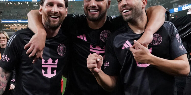 Jan 18, 2025; Las Vegas, Nevada, USA; Inter Miami CF forward Lionel Messi (10), Inter Miami CF defender Marcelo Weigandt (57), and Inter Miami CF defender Jordi Alba (18) walk off the field celebrating after the penalty kick winner against Club America at Allegiant Stadium. Mandatory Credit: David Gonzales-Imagn Images     TPX IMAGES OF THE DAY