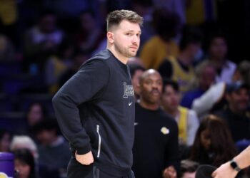 Los Angeles, California February 6, 2025-Lakers Luka Doncic watches the game from the bench during a game with the Warriors at Crypto.com Arena Thursday. (Wally Skalij/Los Angeles Times)