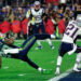 GLENDALE, AZ - FEBRUARY 01:  Malcolm Butler #21 of the New England Patriots intercepts a pass by  Russell Wilson #3 of the Seattle Seahawks intended for  Ricardo Lockette #83 late in the fourth quarter during Super Bowl XLIX at University of Phoenix Stadium on February 1, 2015 in Glendale, Arizona.  (Photo by Rob Carr/Getty Images)