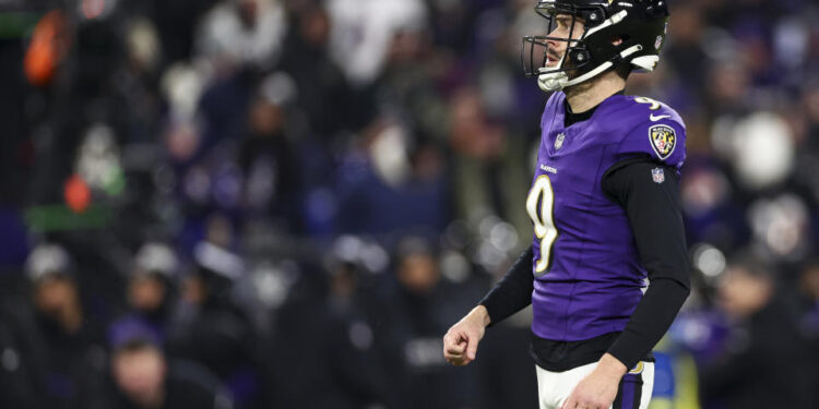 BALTIMORE, MARYLAND - JANUARY 11: Justin Tucker #9 of the Baltimore Ravens lines up before a kick during an NFL football wild card playoff game against the Pittsburgh Steelers at M&T Bank Stadium on January 11, 2025 in Baltimore, Maryland. (Photo by Kevin Sabitus/Getty Images)