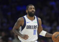 Dallas Mavericks' Kyrie Irving plays during an NBA basketball game, Tuesday, Feb. 4, 2025, in Philadelphia. (AP Photo/Matt Slocum)