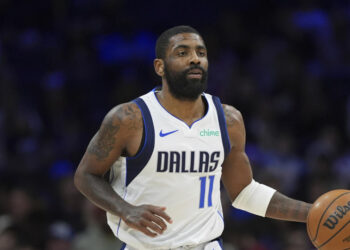 Dallas Mavericks' Kyrie Irving plays during an NBA basketball game, Tuesday, Feb. 4, 2025, in Philadelphia. (AP Photo/Matt Slocum)