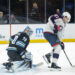 Jan 31, 2025; Salt Lake City, Utah, USA;  Columbus Blue Jackets left wing James van Riemsdyk (21) tries to deflect the puck past Utah Hockey Club goaltender Karel Vejmelka (70) and into the net with his skate during the third period at Delta Center. Mandatory Credit: Chris Nicoll-Imagn Images