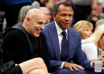 MINNEAPOLIS, MINNESOTA - DECEMBER 30: Co-owners Alex Rodriguez (R) and Marc Lore of the Minnesota Timberwolves look on in the second quarter during the game against the Los Angeles Lakers at Target Center on December 30, 2023 in Minneapolis, Minnesota. NOTE TO USER: User expressly acknowledges and agrees that, by downloading and or using this photograph, User is consenting to the terms and conditions of the Getty Images License Agreement. (Photo by David Berding/Getty Images)